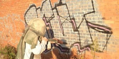 An image of Tyseley Industrial Park using shot blasting techniques to remove graffiti