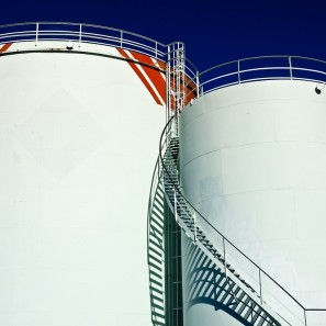 Image of two large gasoline tanks
